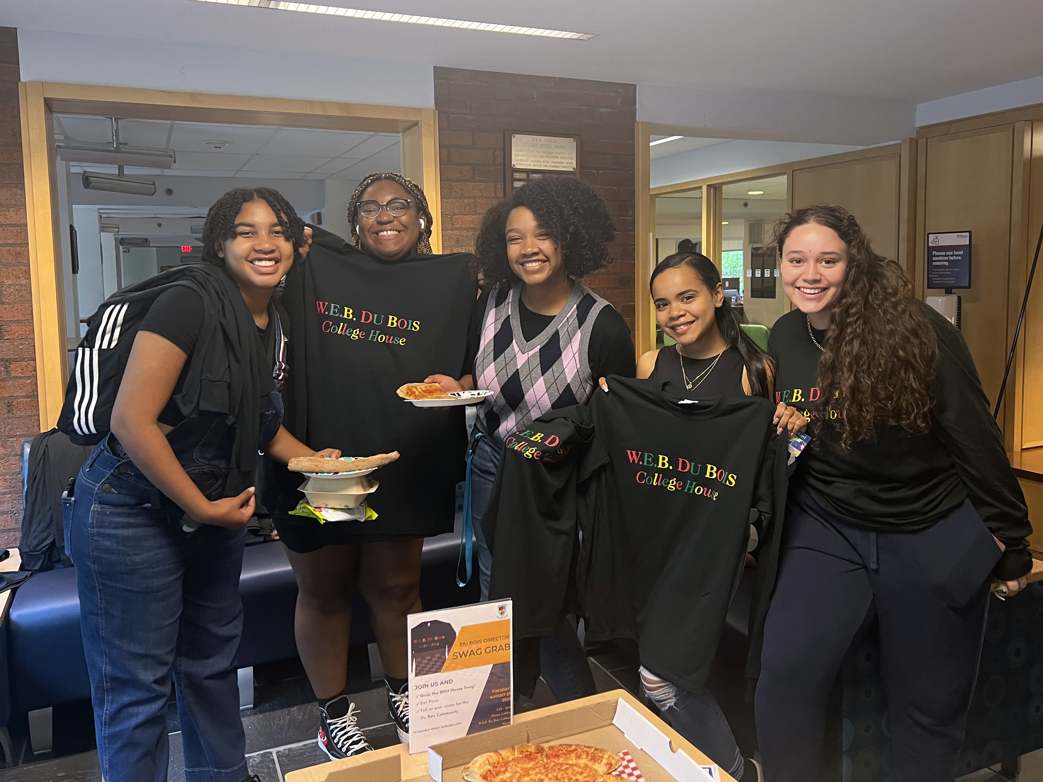 Du Bois residents posing with House T-shirts